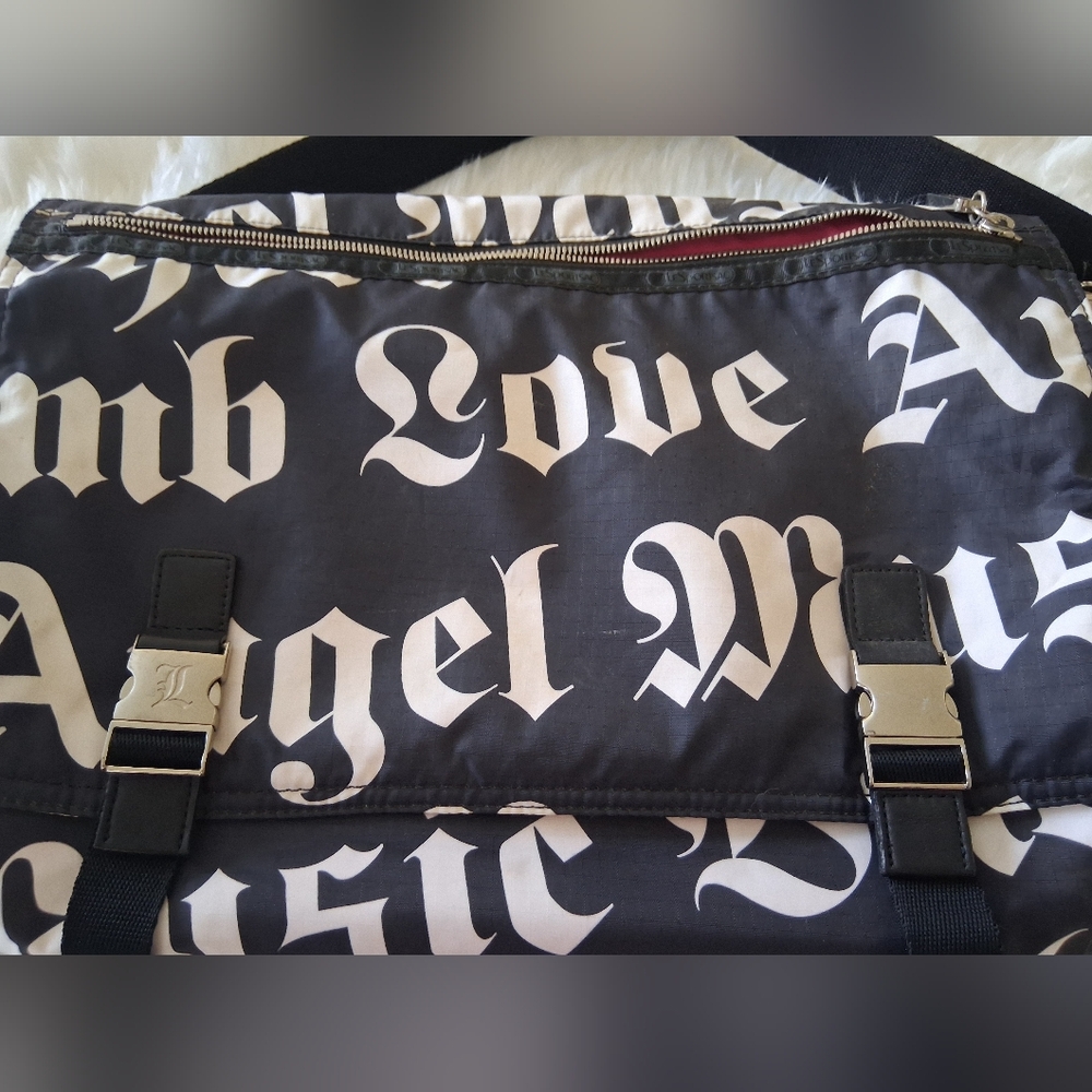 L.A.M.B. x LeSportsac Messenger Bag • Gothic Text Print • Multi‑Pocket Crossbody